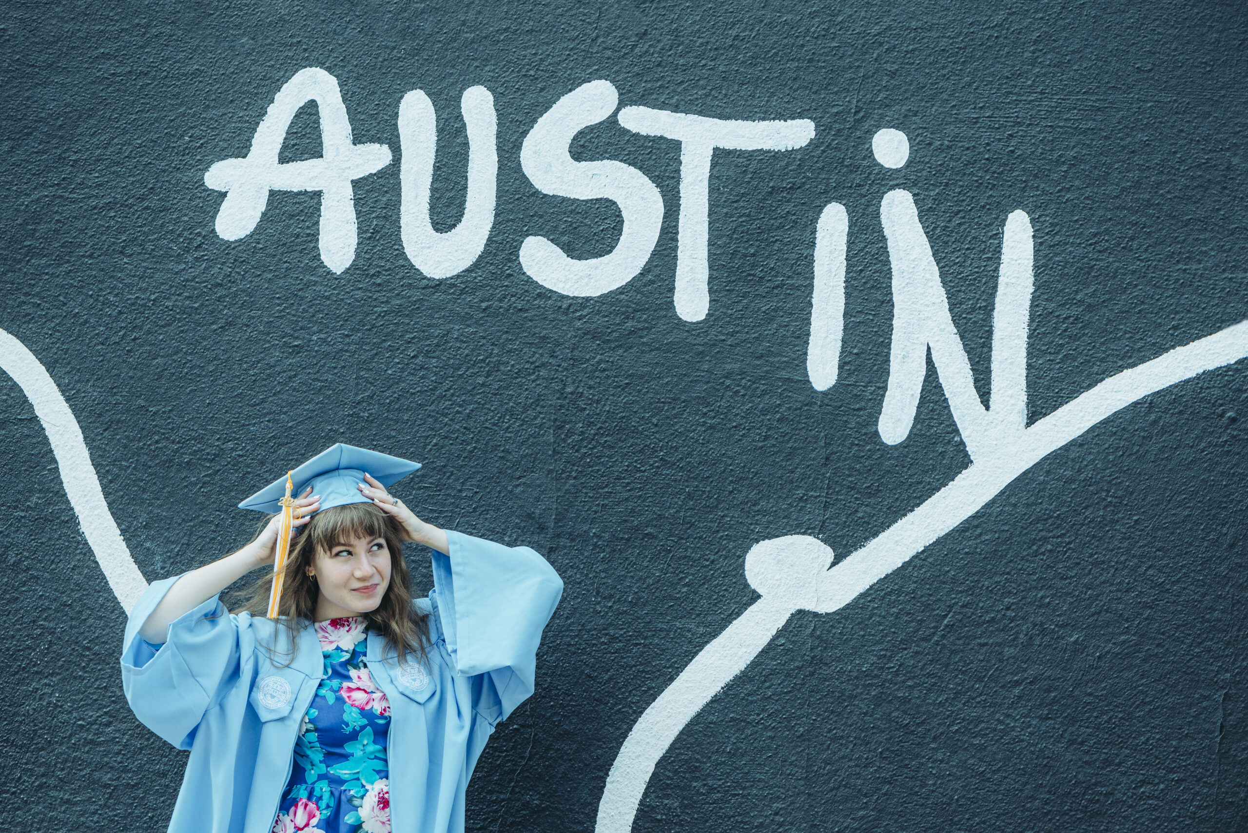 a high school senior in austin texas posing for her portriats
